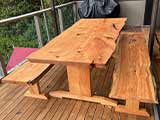 Our kitset table and bench seat frame supporting natural edge slab tops